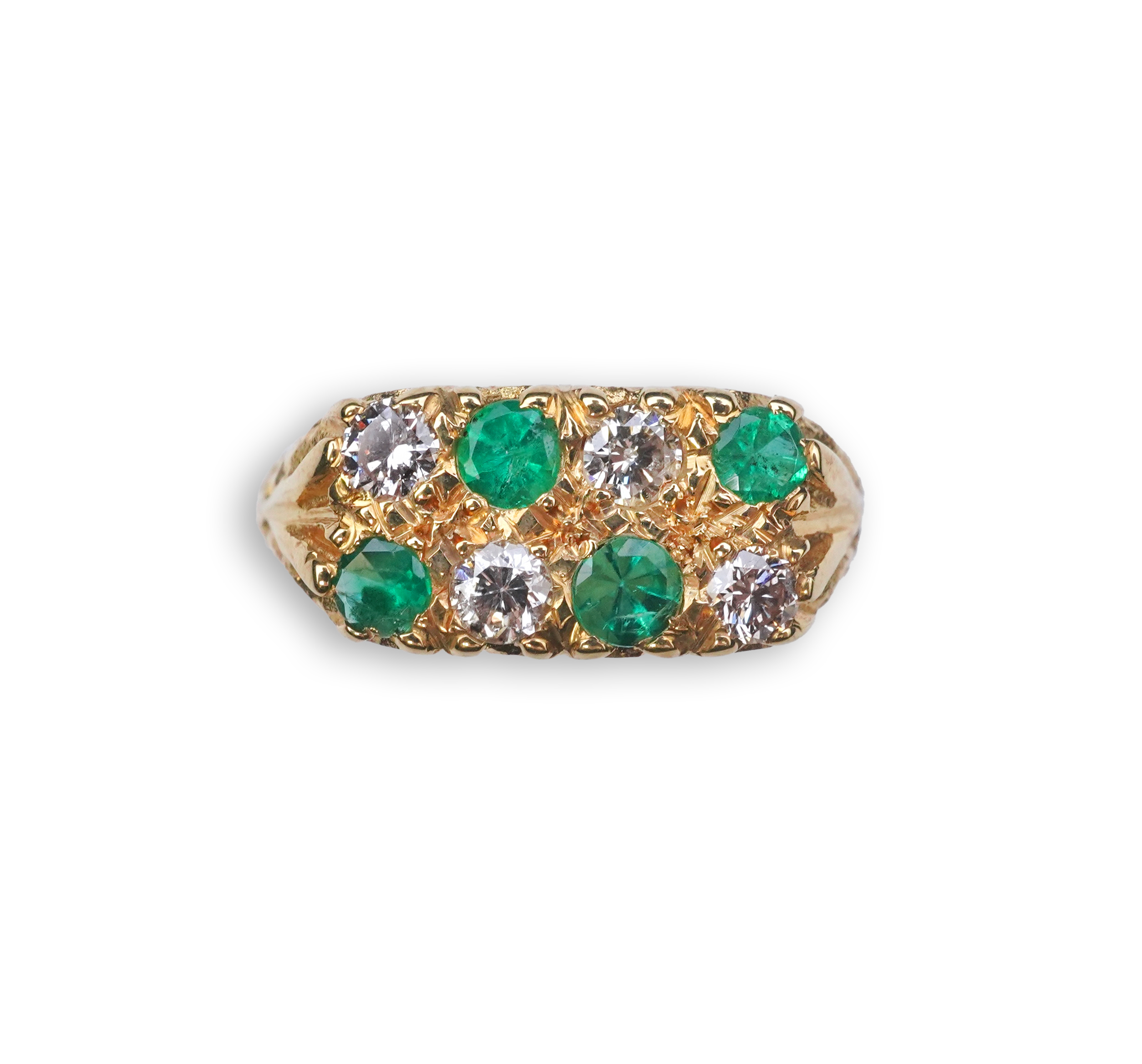 An emerald and diamond ring, circa 1975